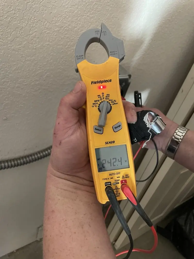 Voltage testing with clamp meter during Hot Tub / Pool Electrical Wiring in Hummelstown